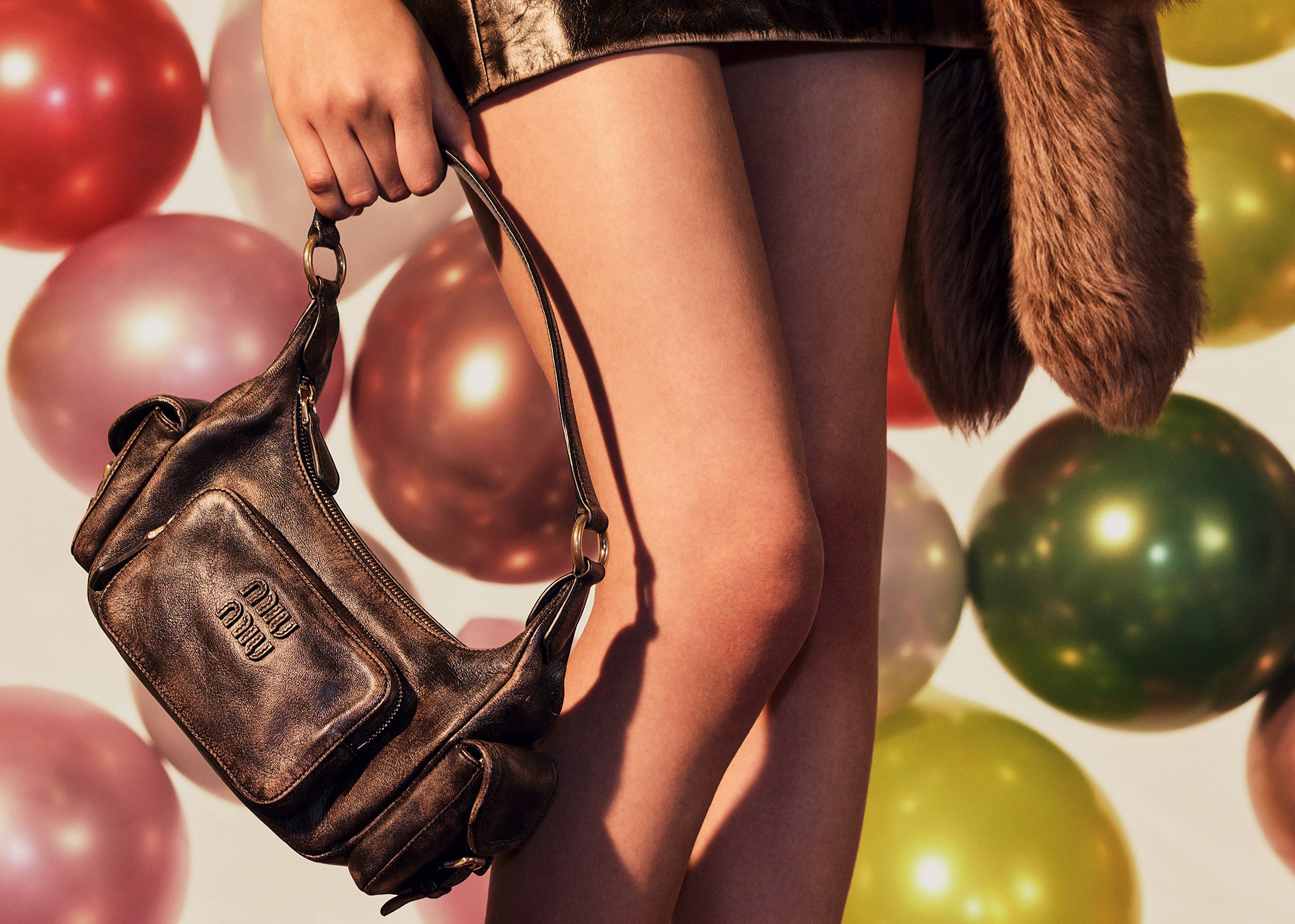 The Power of Accessories: Scarves and Leather Goods Define the Season